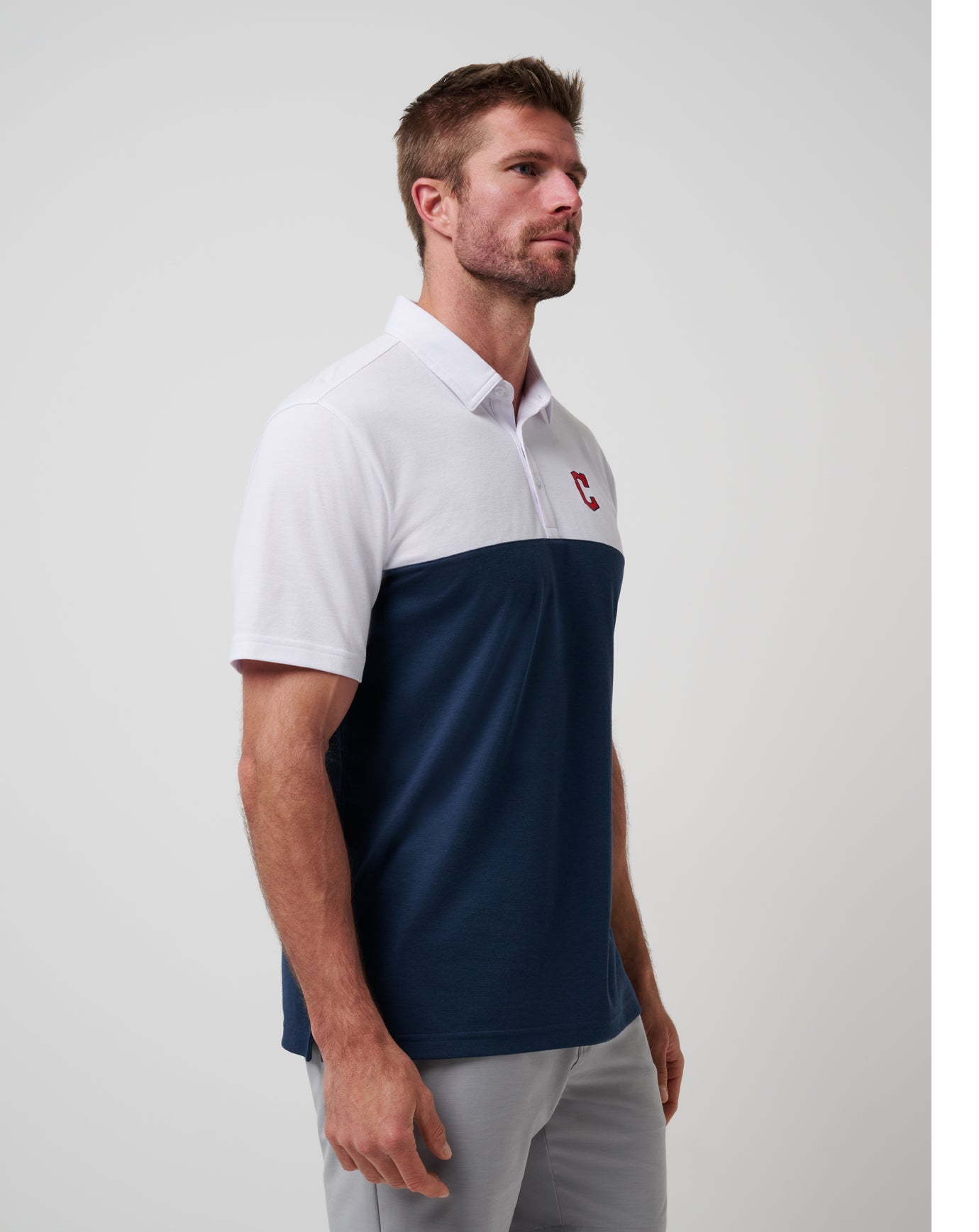 White/Navy Travis Mathew Cleveland Guardians Home Run Leader Polo