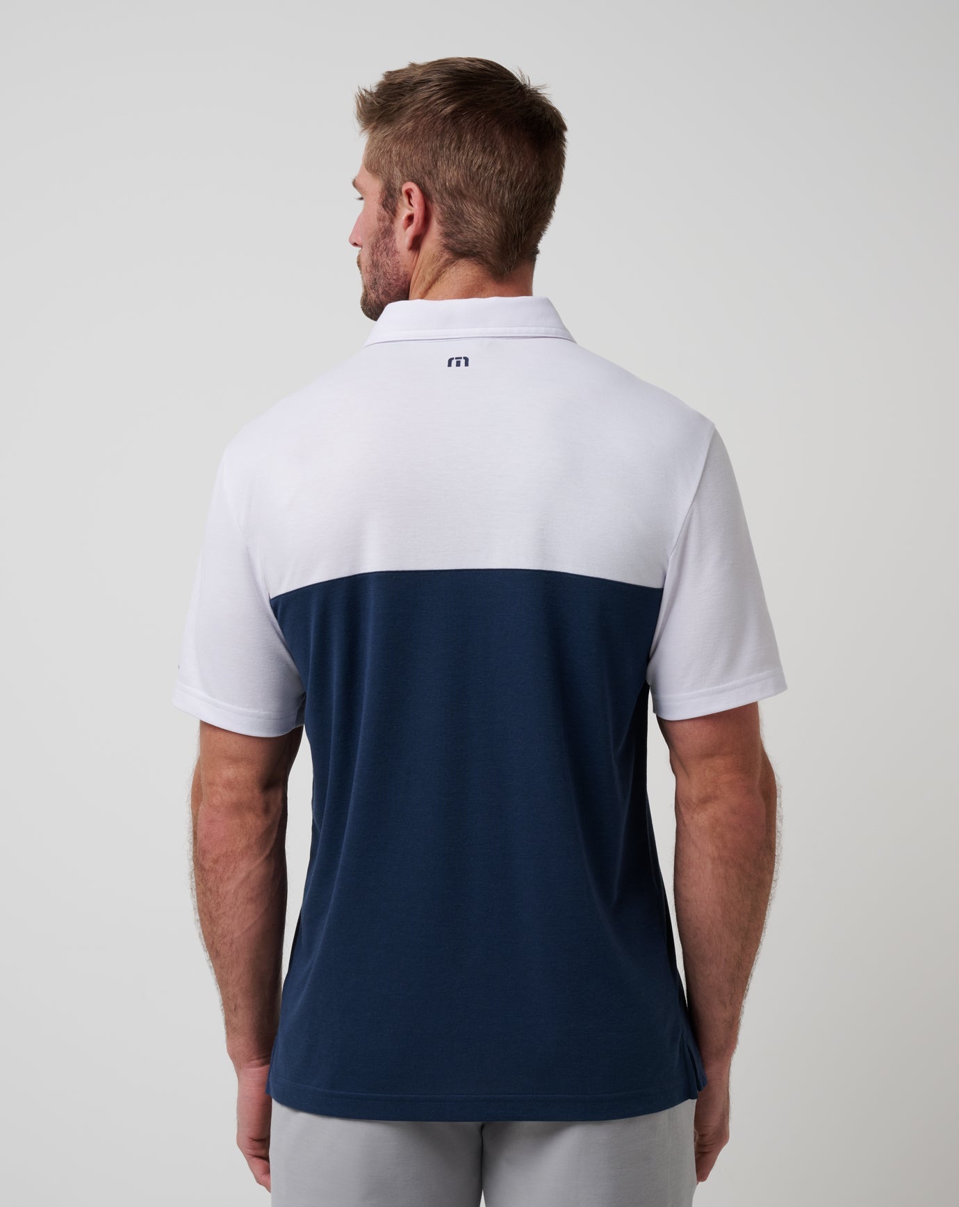White/Navy Travis Mathew Cleveland Guardians Home Run Leader Polo