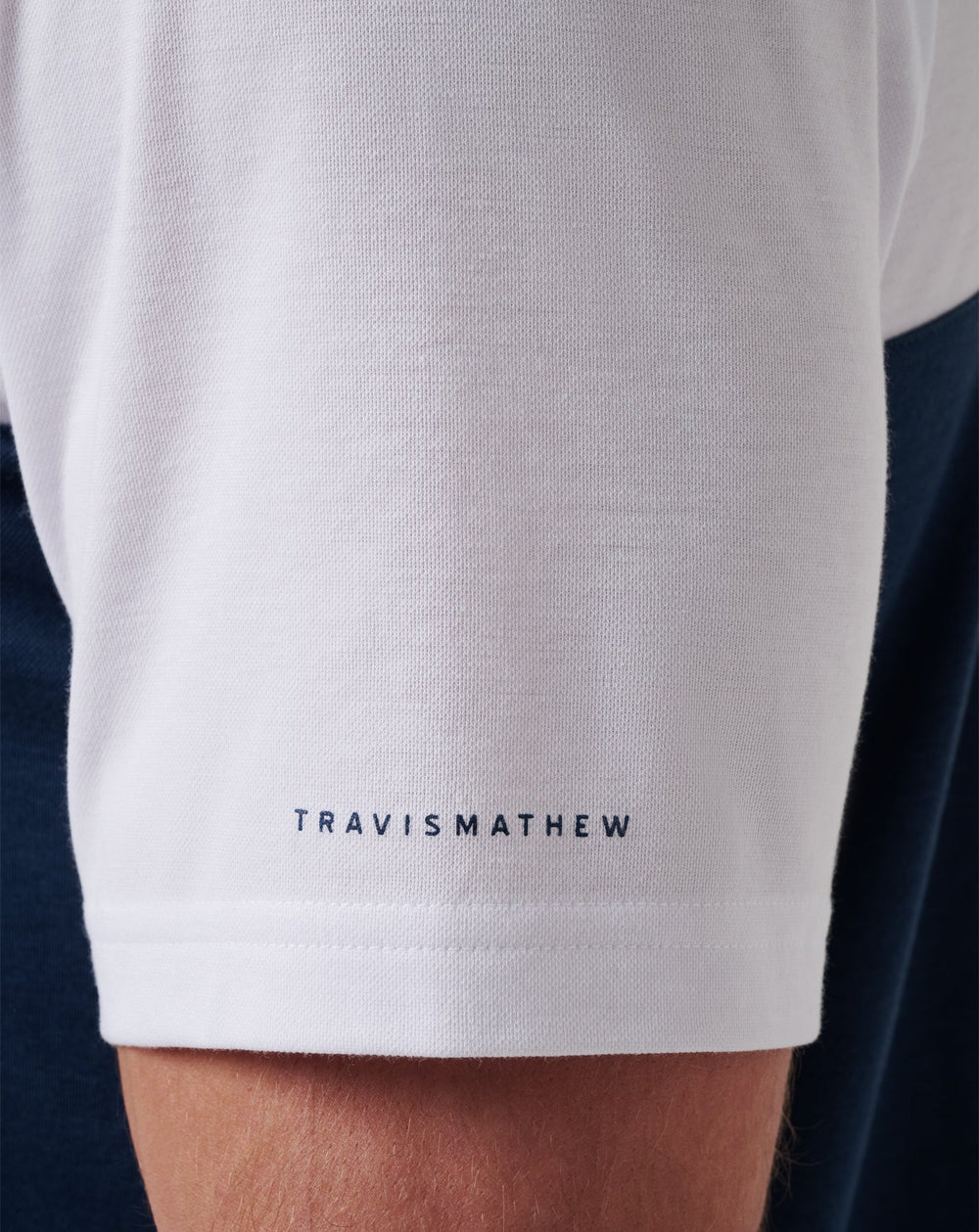 White/Navy Travis Mathew Cleveland Guardians Home Run Leader Polo