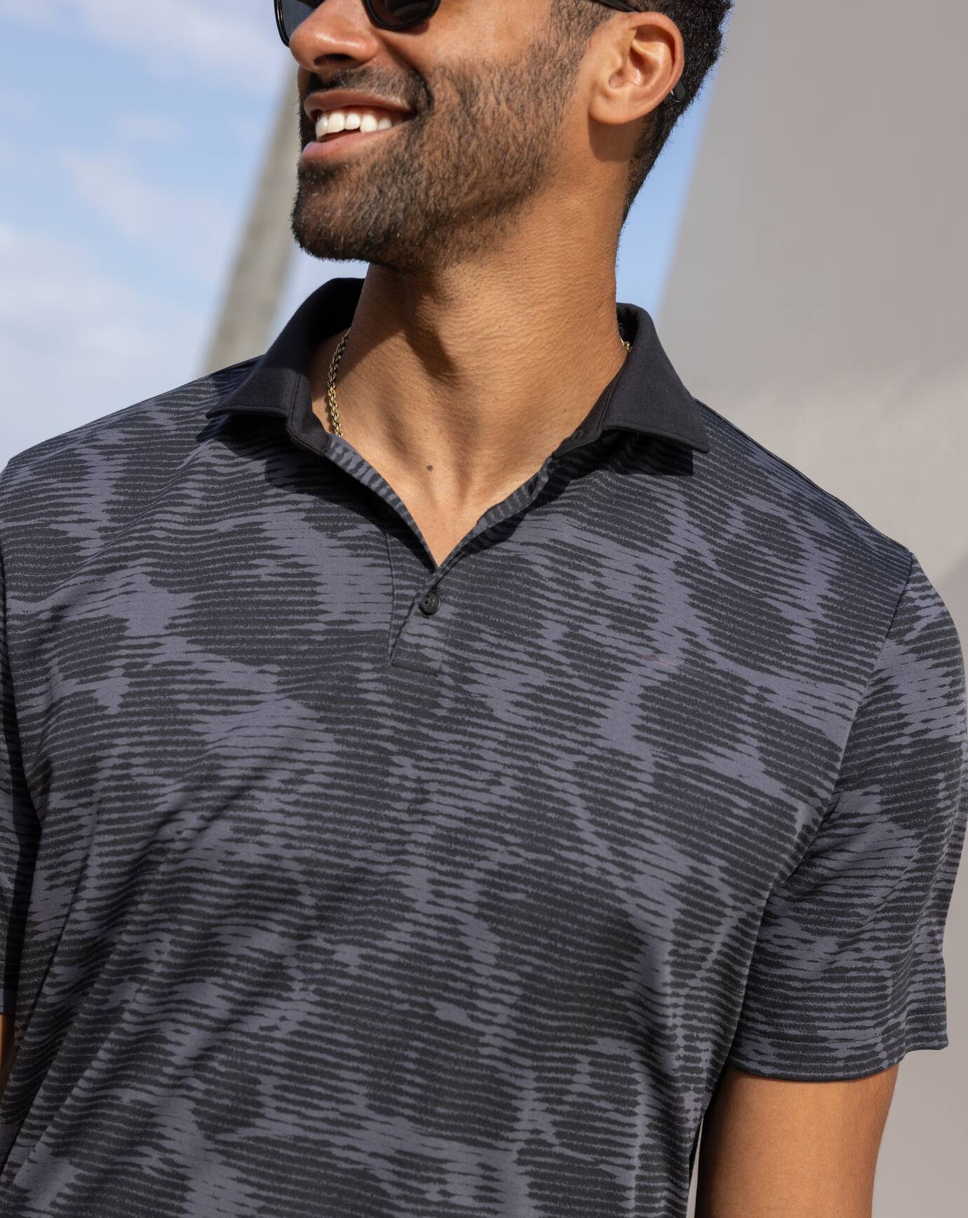 Black Travis Mathew Study Abroad Polo