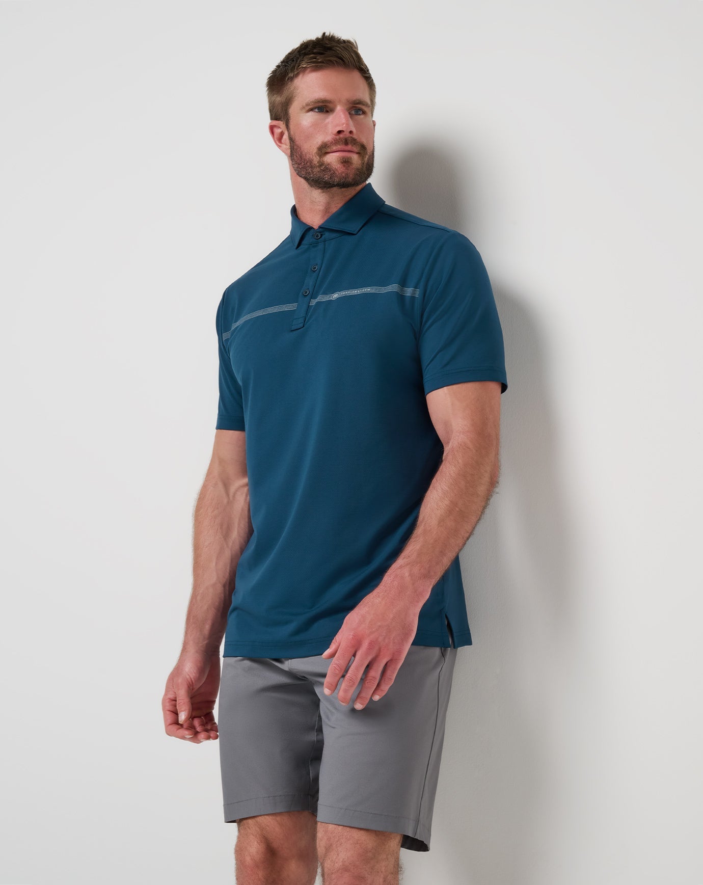 Titan Travis Mathew Heater Pro Chest Stripe Polo