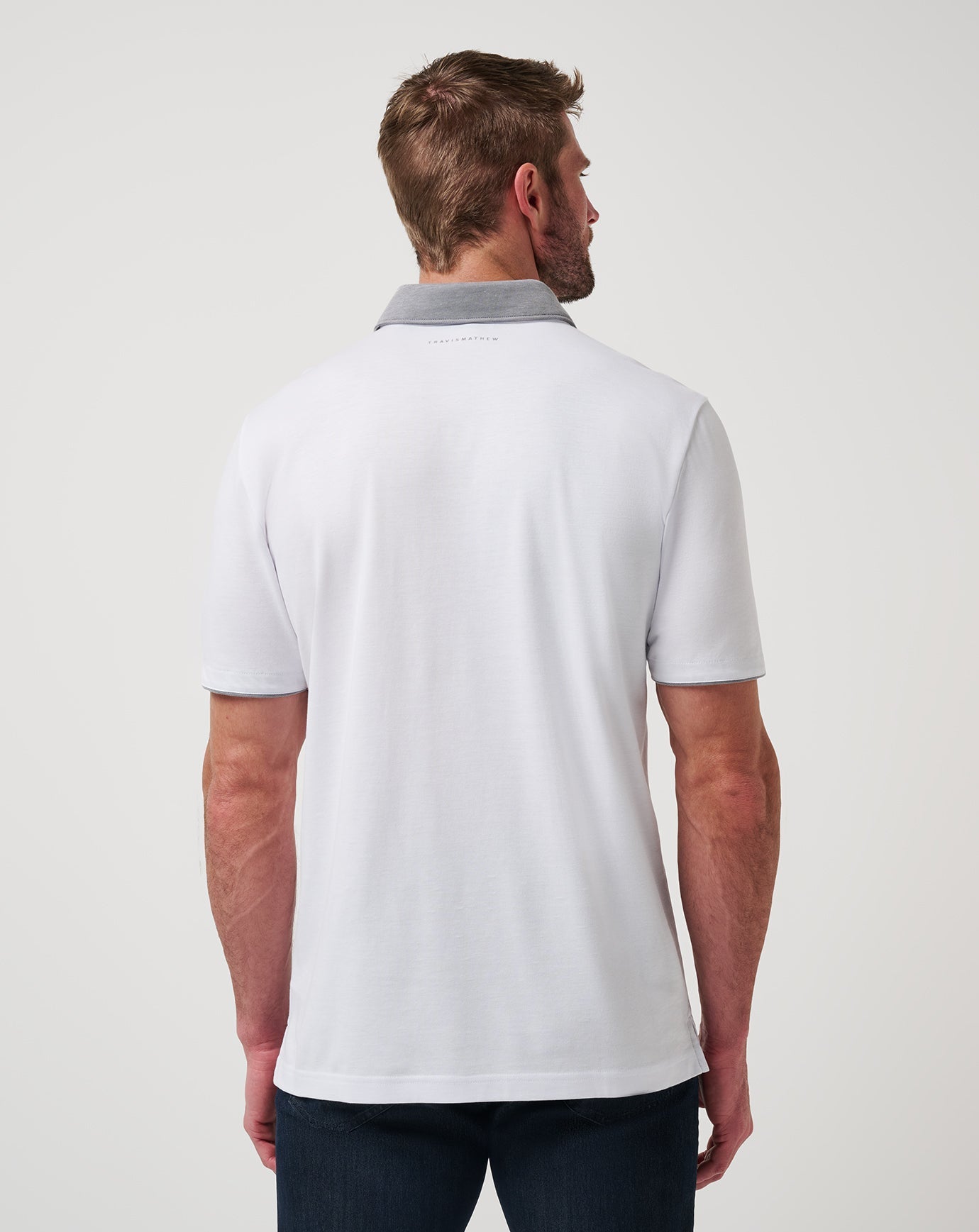 White Travis Mathew Reservation Number Polo