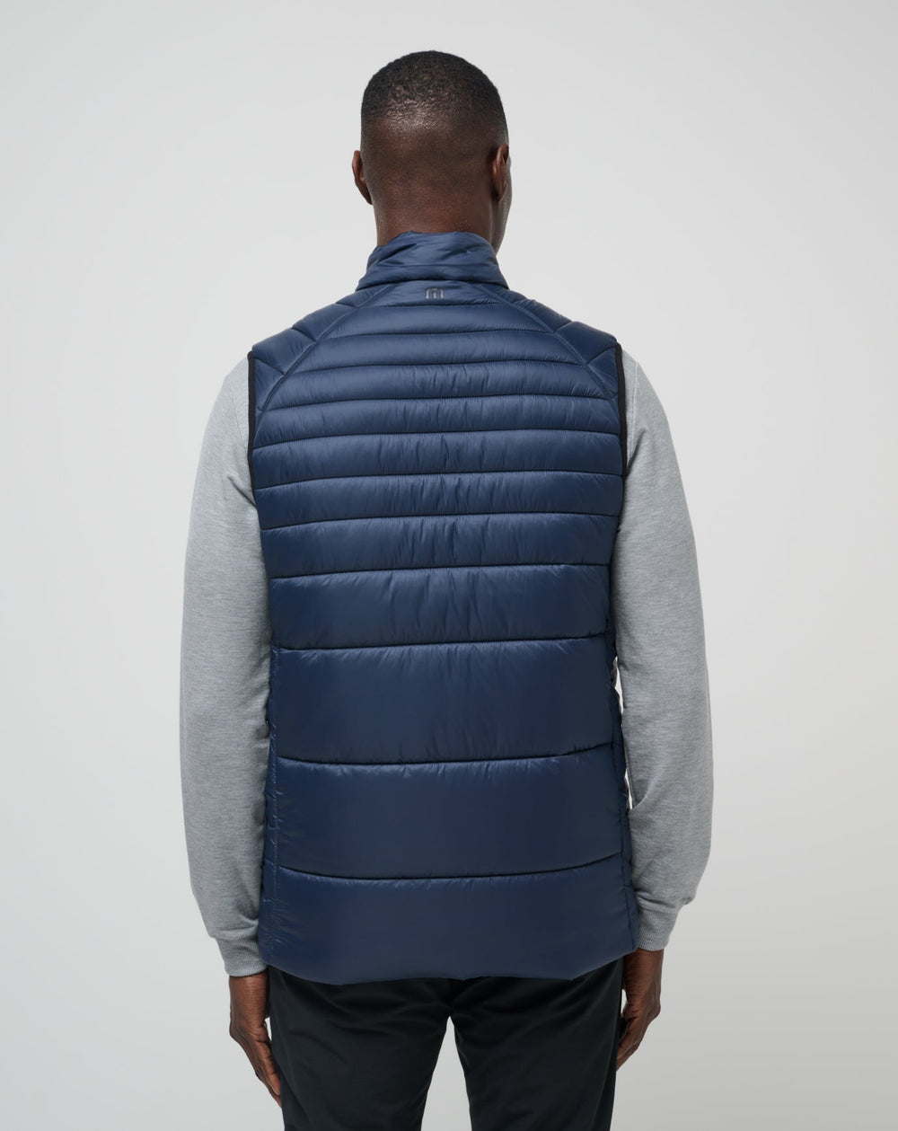 Total Eclipse Travis Mathew Aves Tech Puffer Vest