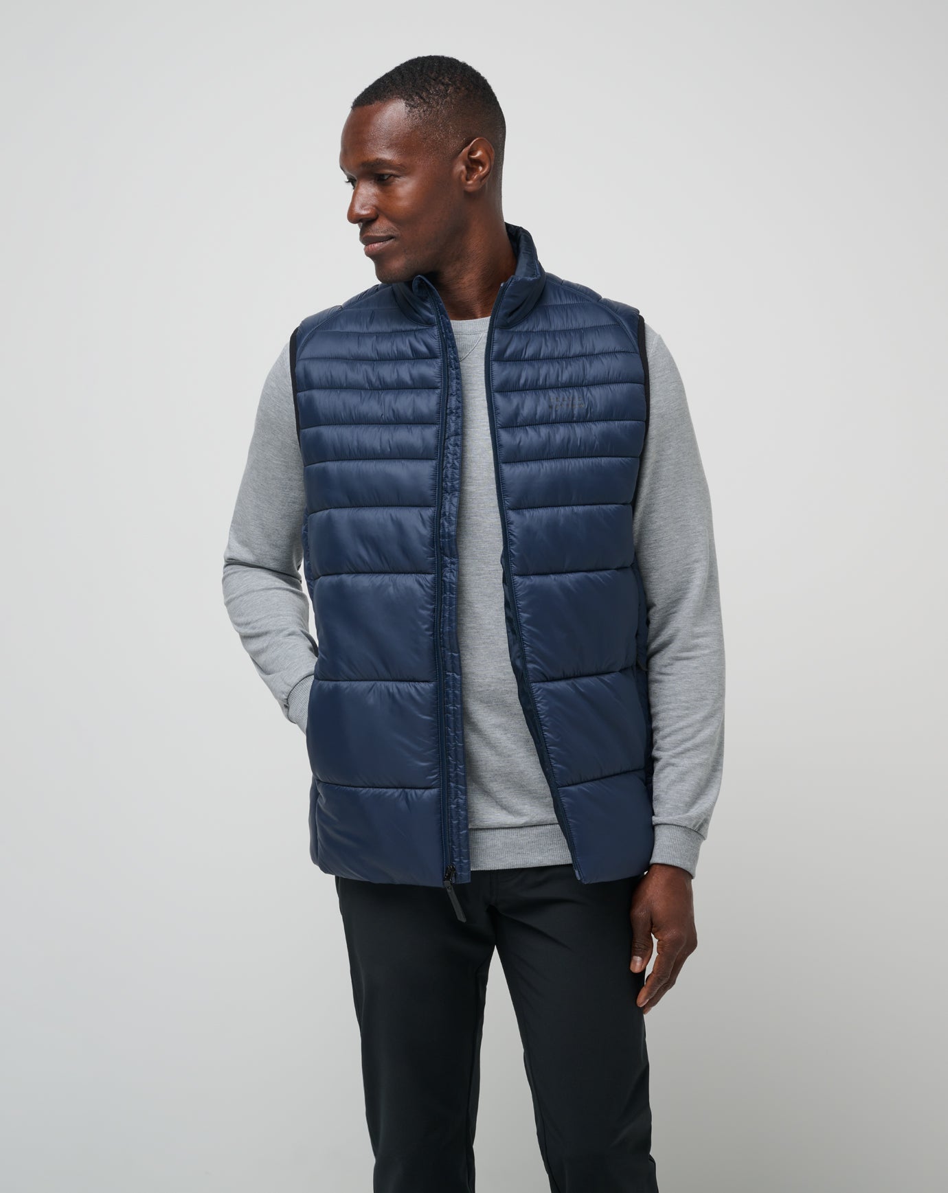 Total Eclipse Travis Mathew Aves Tech Puffer Vest
