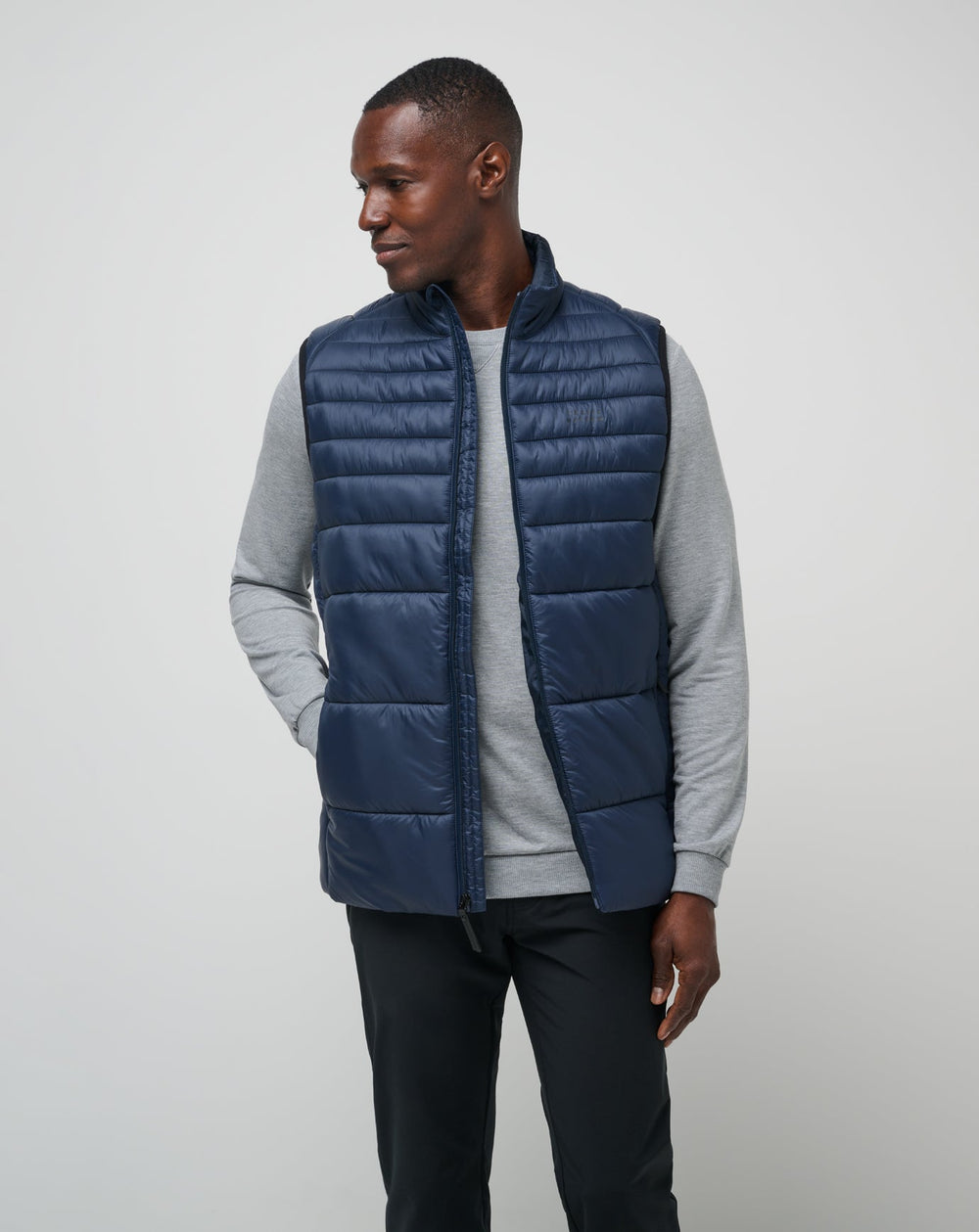 Total Eclipse Travis Mathew Aves Tech Puffer Vest