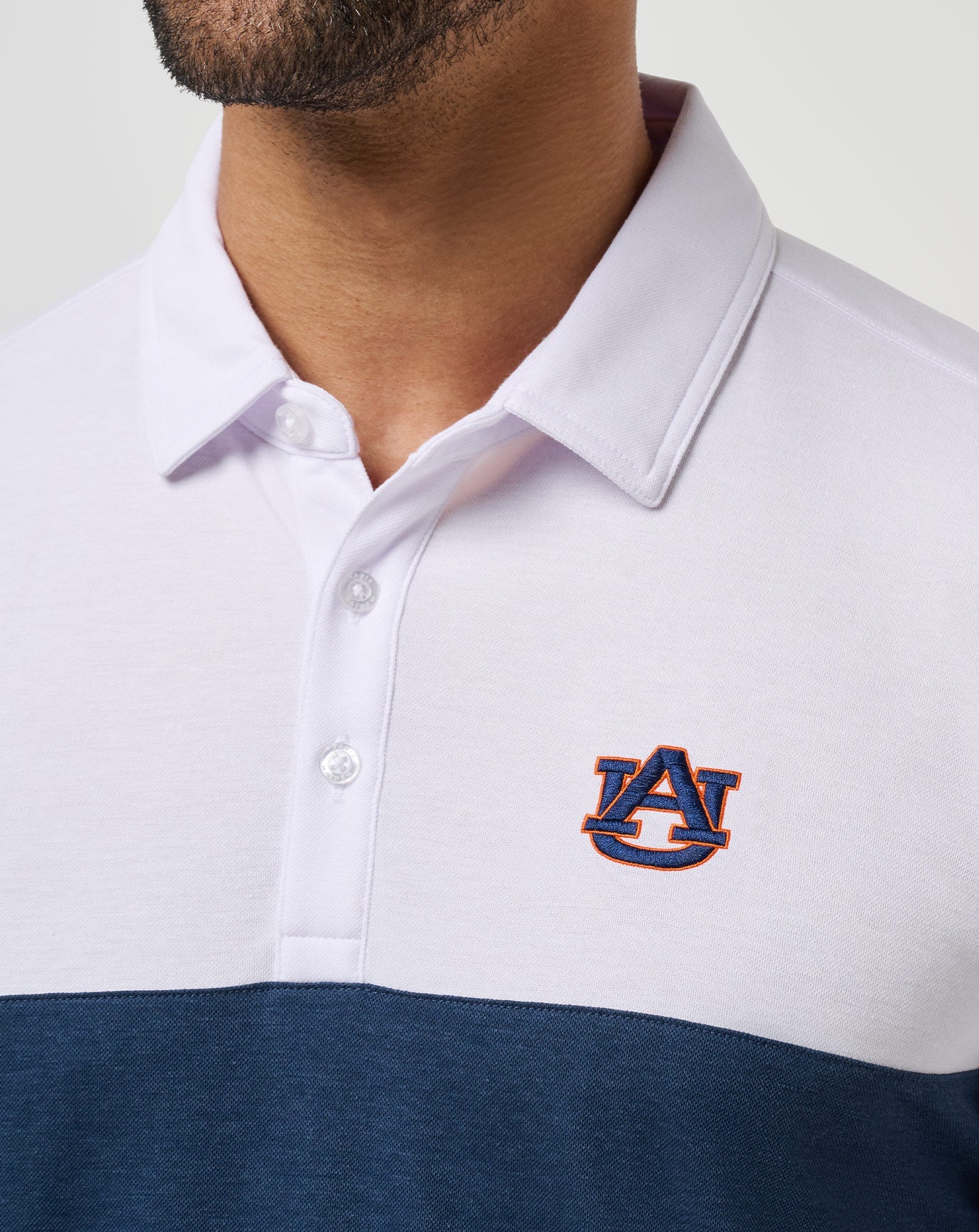 White/Navy Travis Mathew Auburn Drop Back Polo