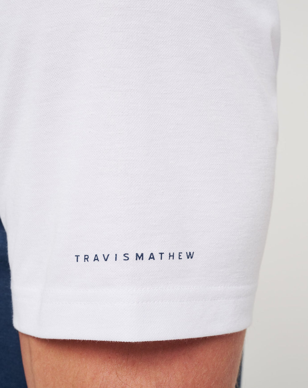 White/Navy Travis Mathew Mississippi Drop Back Polo