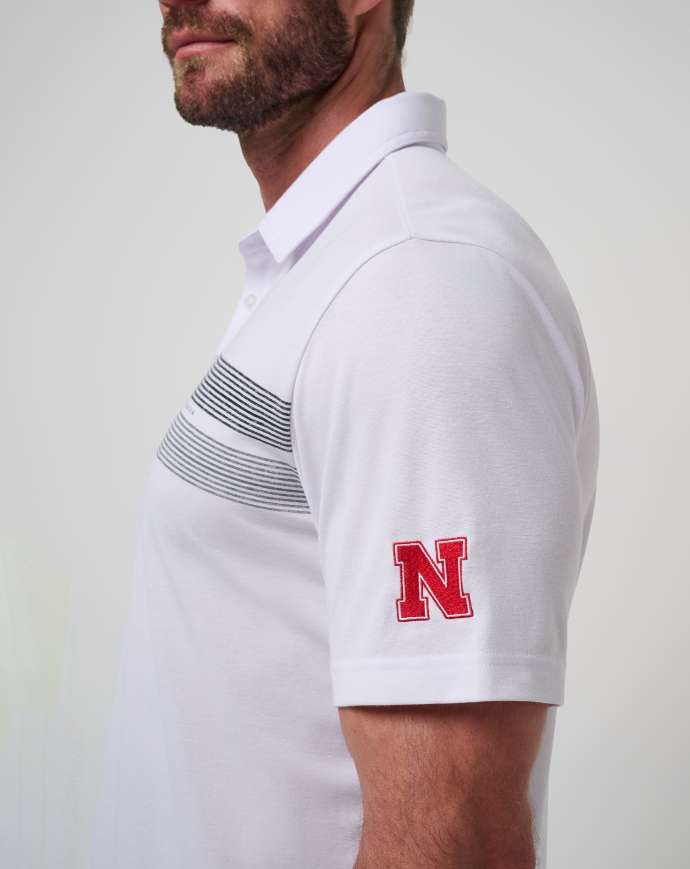 White/Black Travis Mathew Nebraska Top Recruit Polo