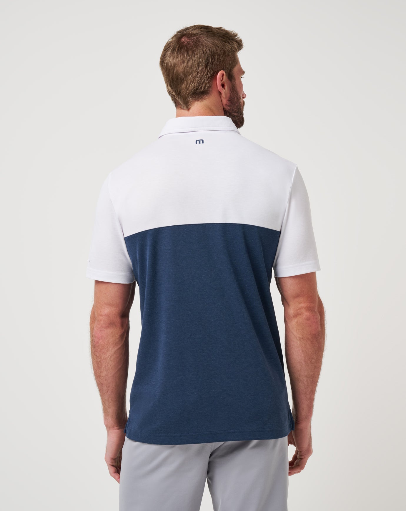 White/Navy Travis Mathew Michigan Drop Back Polo