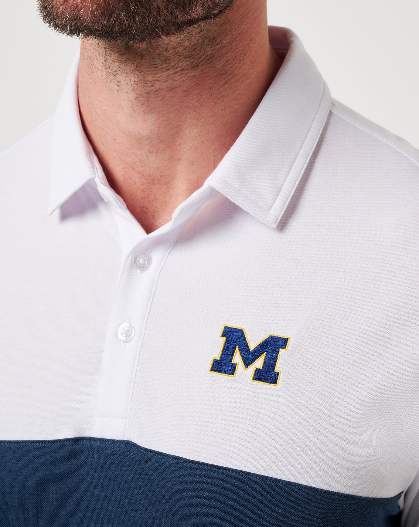 White/Navy Travis Mathew Michigan Drop Back Polo