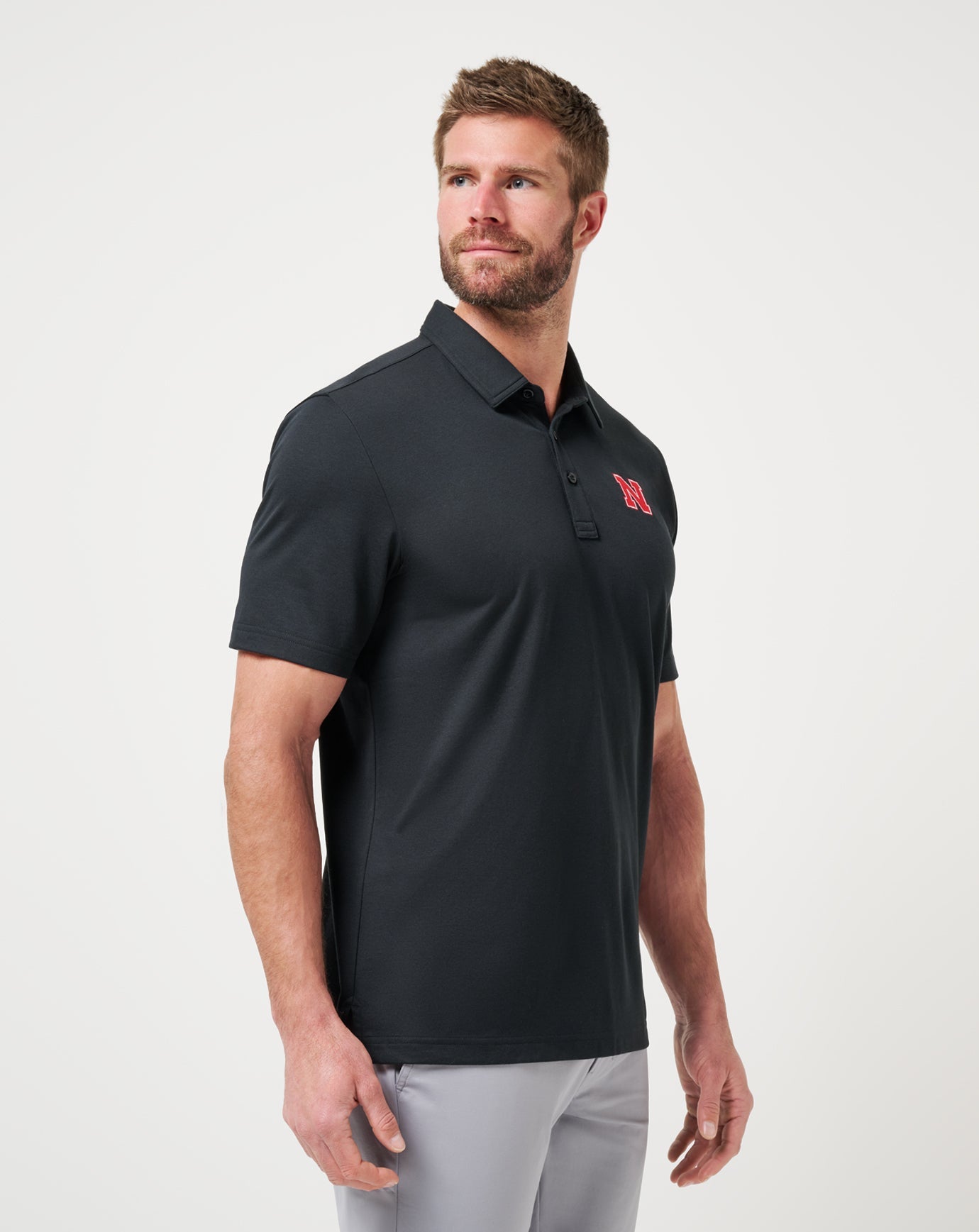 Black Travis Mathew Nebraska School Pride Polo