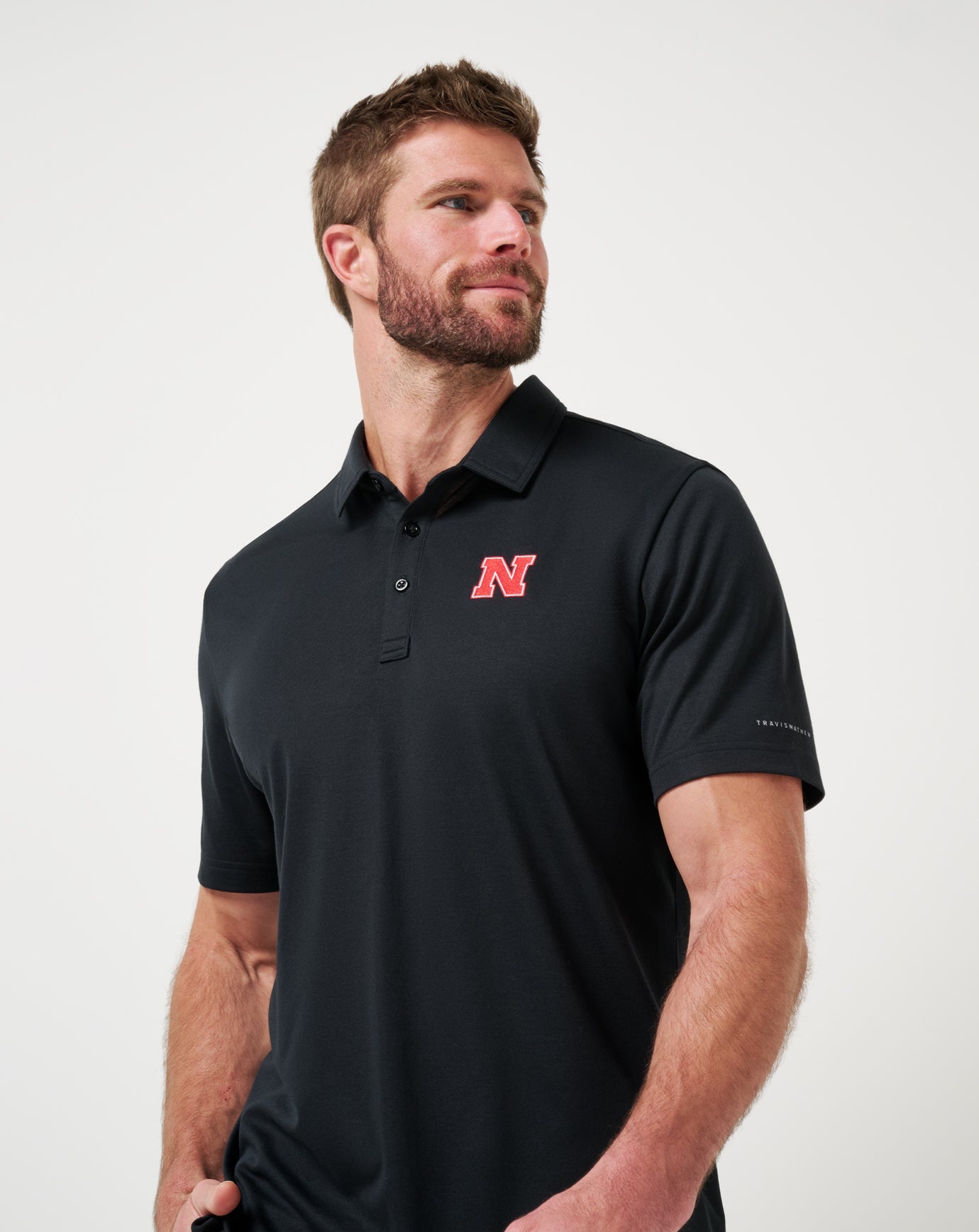 Black Travis Mathew Nebraska School Pride Polo